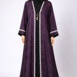 Dark purple abaya with a textured leaf pattern